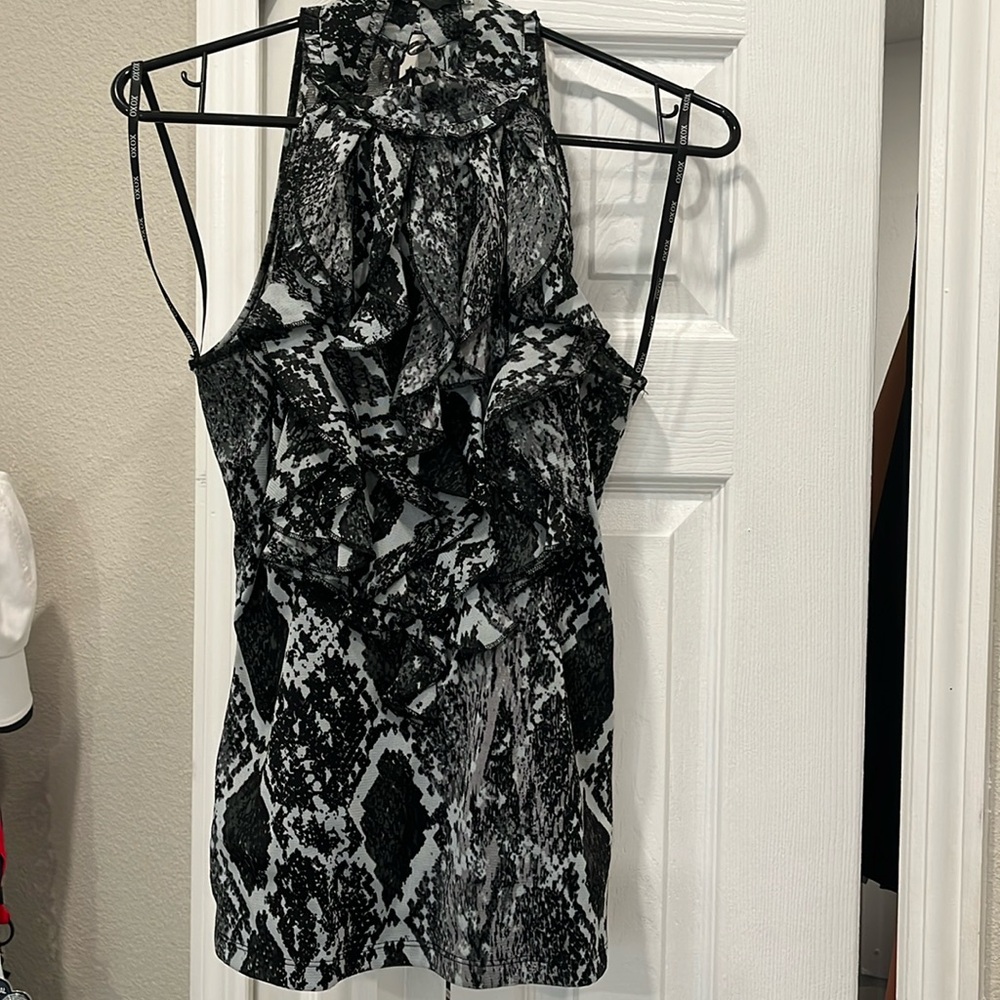 Black & white, ruffled halter top. Medium. Used, great condition.